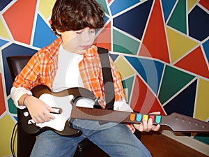 Child playing guitar