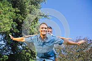 Child playing with his father