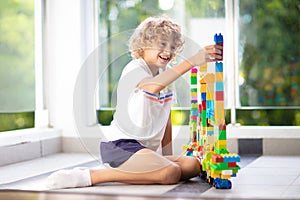 Child playing on home balcony