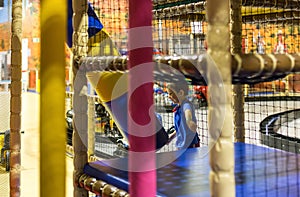 Child playing inside playground