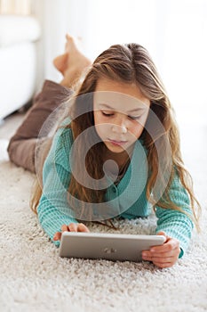 Child playing on ipad