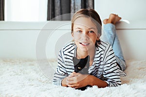 Child playing with kitten