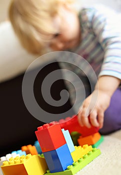 Child playing Lego bricks