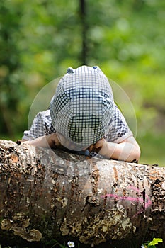 Child playing peekaboo