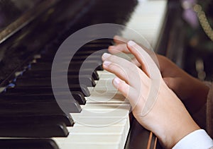 Child playing the piano