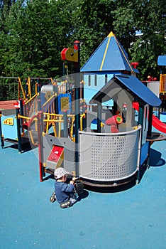 Child playing on a playground