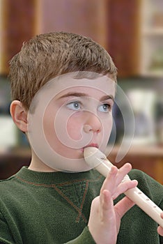 Child Playing Recorder