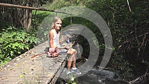 Child Playing by River Water, Kid at Camping in Mountains, Girl in Nature