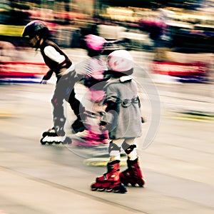 Child playing rollerblade photo