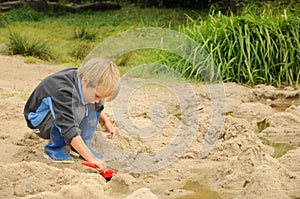 Child playing with sand