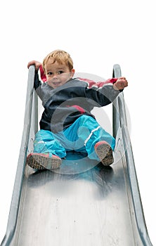 Child playing on slide