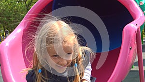 Child Playing on Slide at Playground, Kid Portrait Sliding in Tube Toy, Happy Girl Smile Relaxed Outdoor in Park, Happy Children