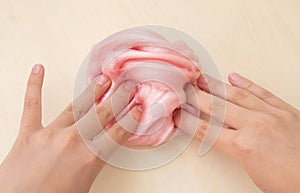 Child playing with slime