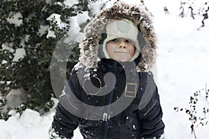 Child Playing With Snow