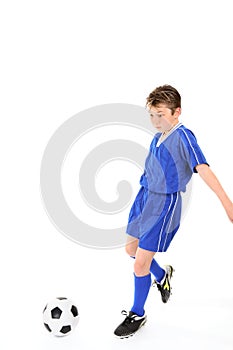 Child playing soccer