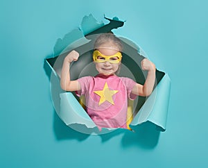 Child playing superhero