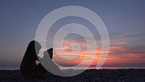 Child Playing Tablet on Beach, Sunset, Girl Silhouette, Seashore at Sunrise 4K