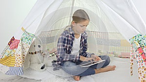 Child Playing Tablet in Playroom Girl Writing Homework for School Kid Playground