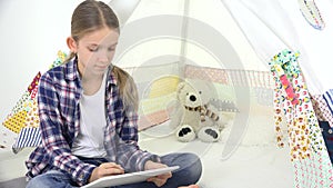 Child Playing Tablet in Playroom Girl Writing Homework for School Kid Playground