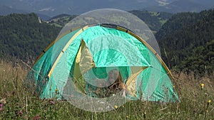 Child Playing in Tent at Camping in Mountains, Kid Waving Goodbye, Tourist Girl in Alpine Trip, Excursion, Children Outdoor