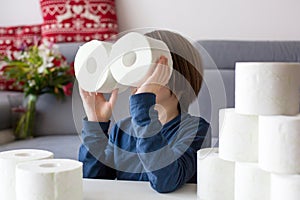 Child, playing with toilet paper photo