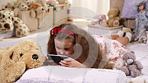 Child playing on a touch screen phone
