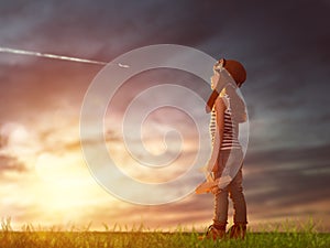 Child playing with toy airplane