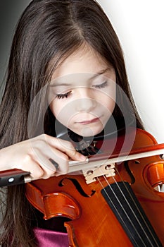 Child playing violin photo