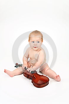 The child playing with a violin