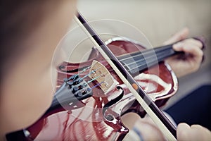 Child playing a violin