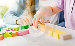 Child playing with wood blocks