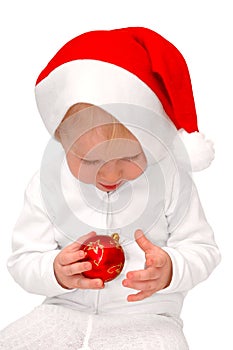 Child plays with christmas toy