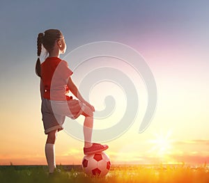 Child plays football