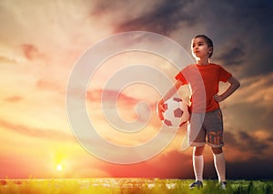 Child plays football