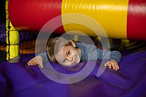 Child Plays in Play Center