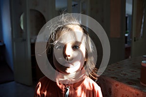 Child portrait pattern light. cute toddler face with gray eyes. domestic authentic lifestyle shoot