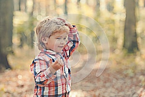 Child portrait smiling. Portrait of child. Funny little boy on nature background. Adorable young happy boy with smile