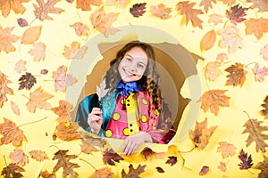 Child in positive mood. season forecast. kid in autumn leaves. little girl in rain protection. Fall fashion. little girl