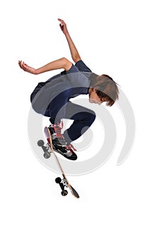 Child practicing a trick on skateboard
