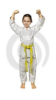 child practising martial arts wearing a judogi