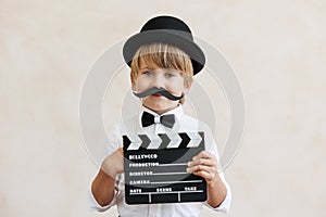 Child pretend to be a director