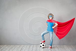 Child pretend to be soccer superhero