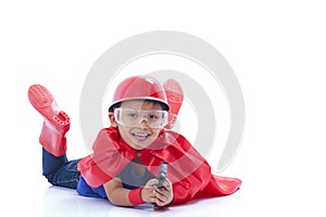 Child pretending to be a superhero with toy gun