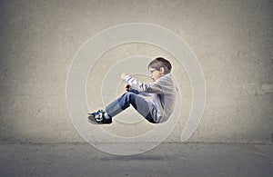 Child pretending to drive a car