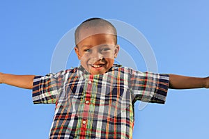 Child Pretending to Fly photo