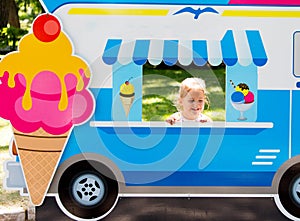 Child pretends to sell ice cream from an ice cream van