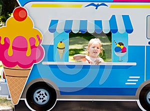 Child pretends to sell ice cream from an ice cream van