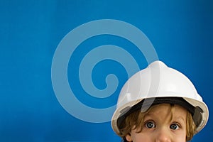 Child with protective helmet