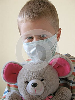 Child in protective mask