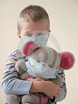 Child in protective mask